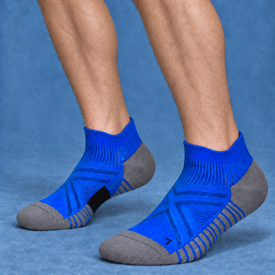 Men's Cushioned Ankle Socks in blue and grey, worn on feet